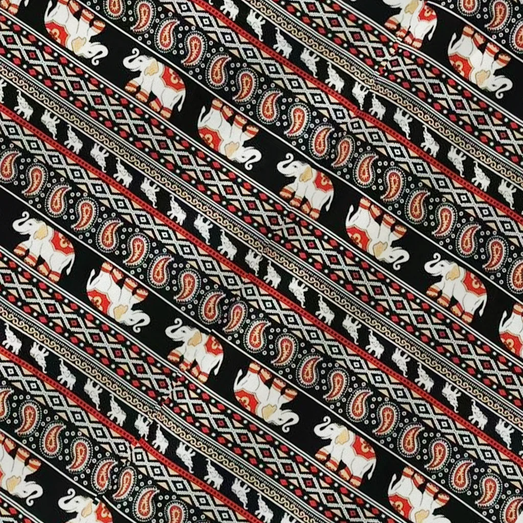 printed fabrics elephant by the clouds